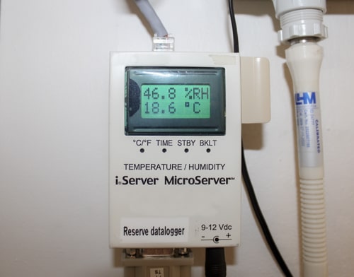 Close-up of device measuring humidity and temperature in the climate chamber