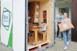 Employees of a company busy filling their Flextor boxes